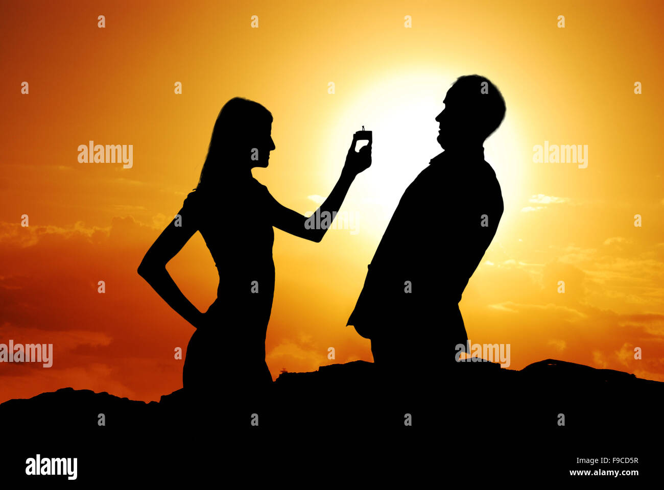 Funny proposal scene with happy woman and man Stock Photo Alamy