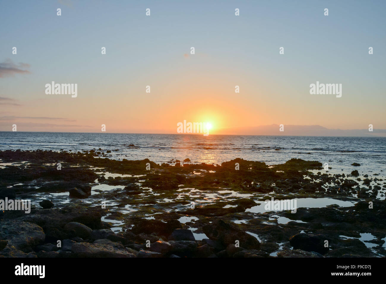 Sea Setting Example The Sun Setting in the Sea Stock Photo - Alamy