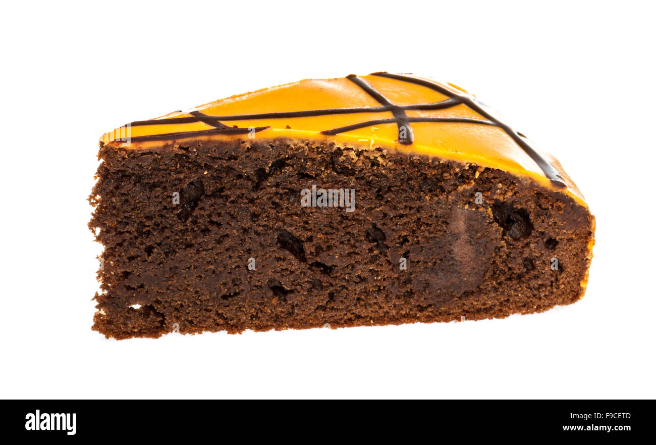 Piece of chocolate cake with icing on white isolated background Stock ...