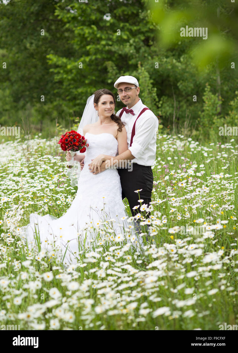 Happy bride and groom on their wedding day Stock Photo - Alamy