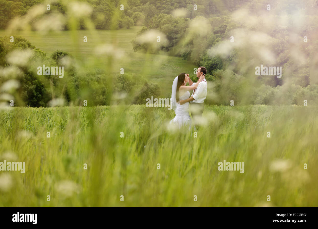 Happy bride and groom on their wedding day Stock Photo - Alamy