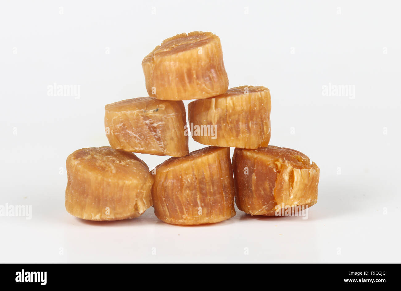 chinese dried scallop on a white background Stock Photo Alamy