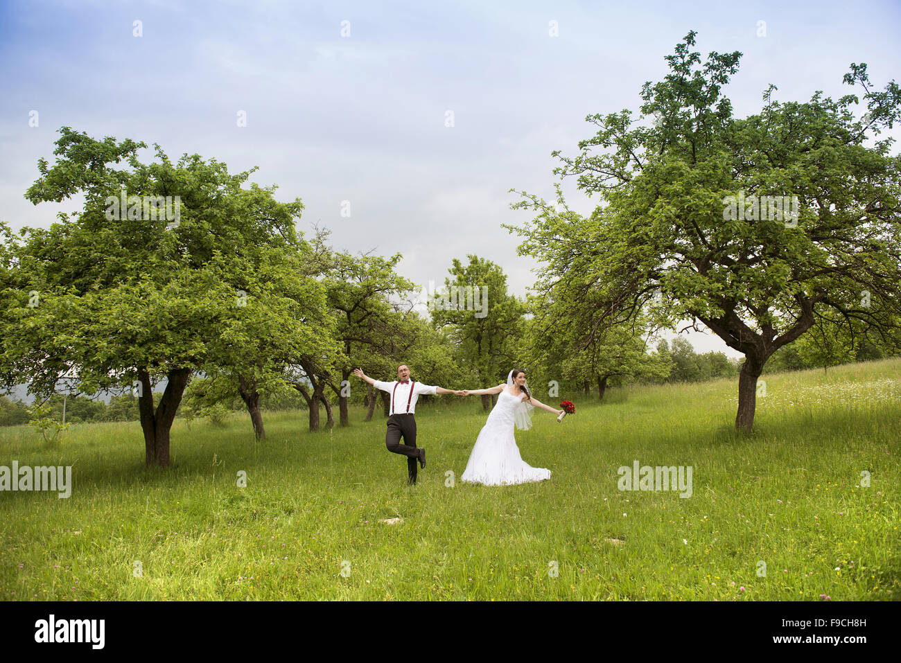 Happy bride and groom on their wedding day Stock Photo - Alamy