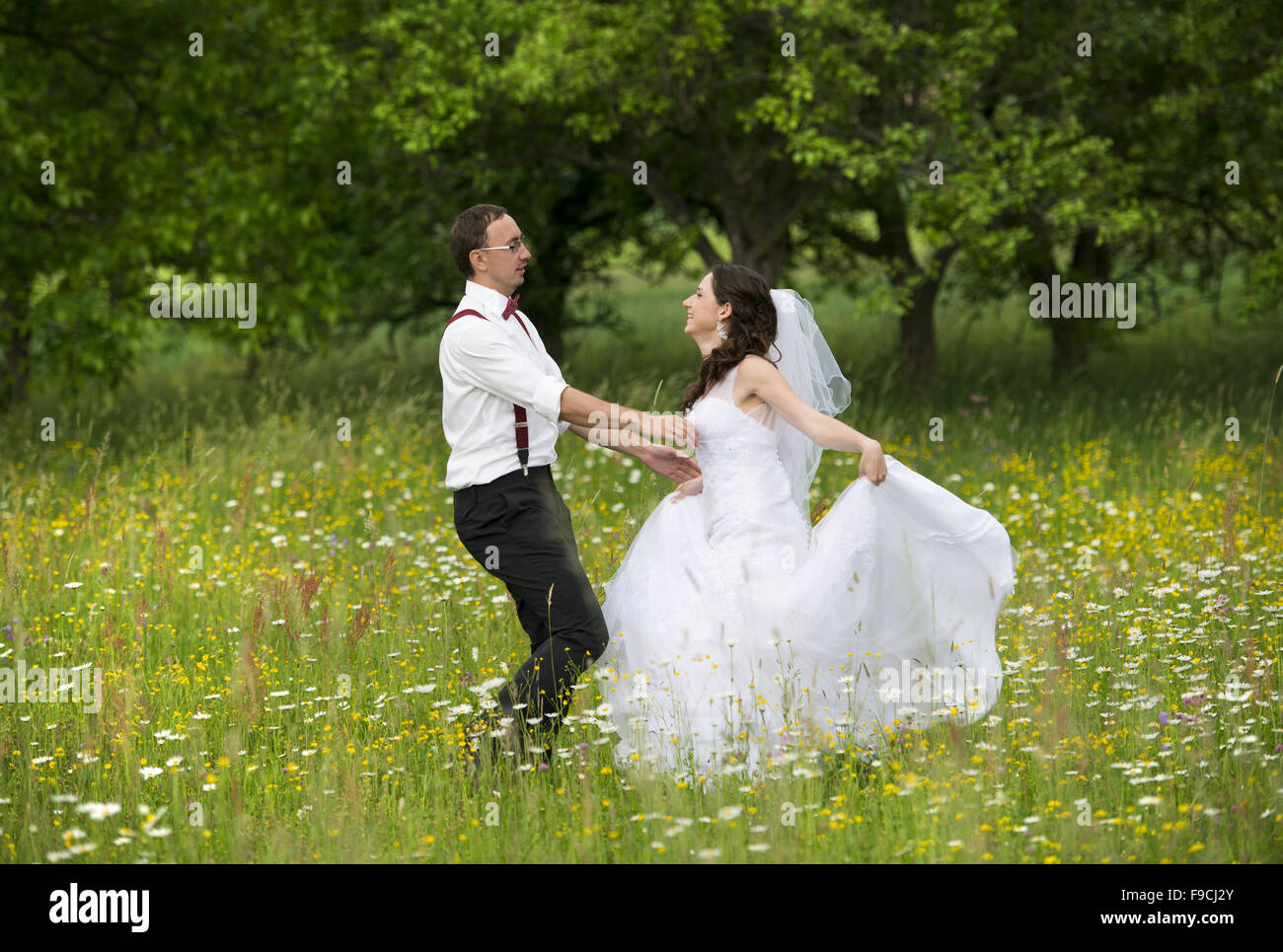 Happy bride and groom on their wedding day Stock Photo - Alamy