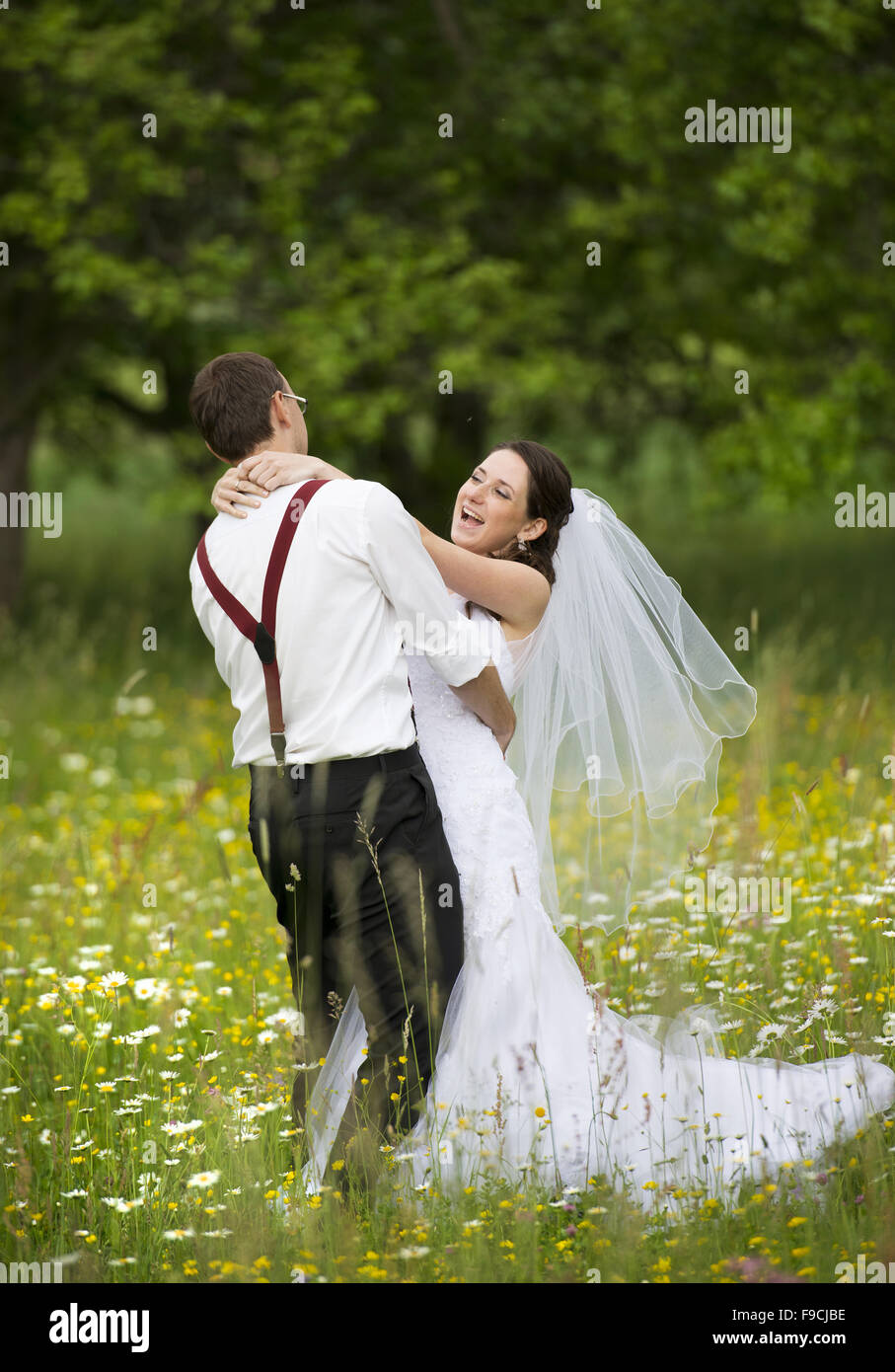 Happy bride and groom on their wedding day Stock Photo - Alamy