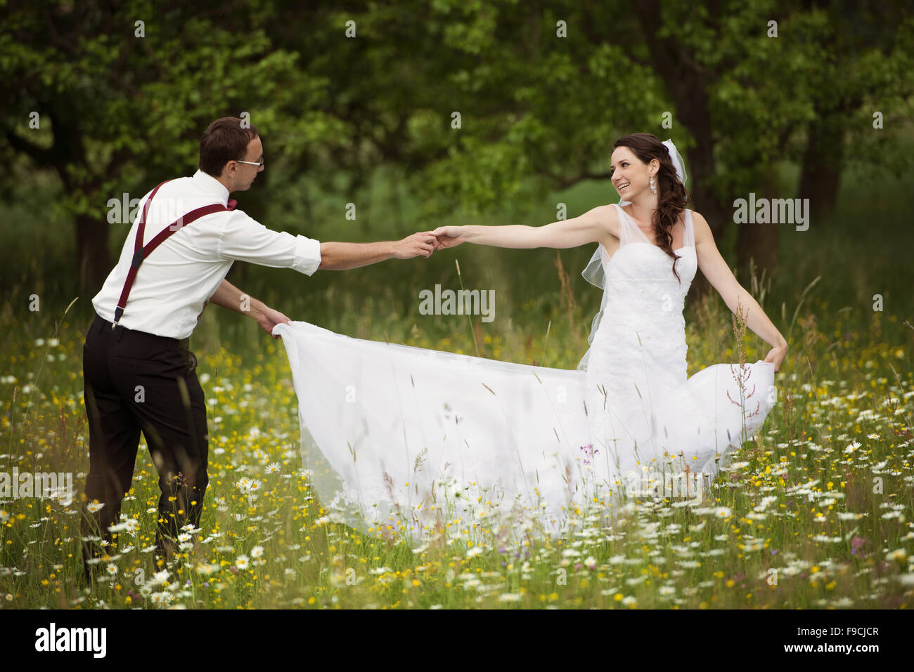 Happy bride and groom on their wedding day Stock Photo - Alamy