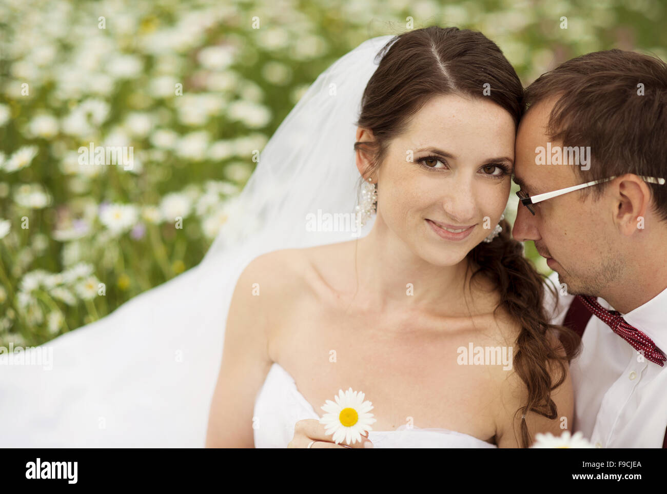 Happy bride and groom on their wedding day Stock Photo - Alamy