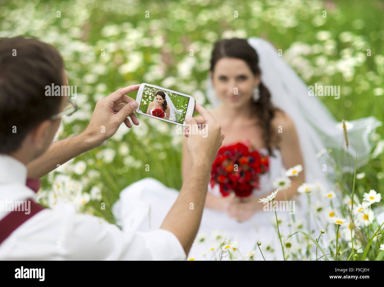 Happy bride and groom on their wedding day Stock Photo - Alamy