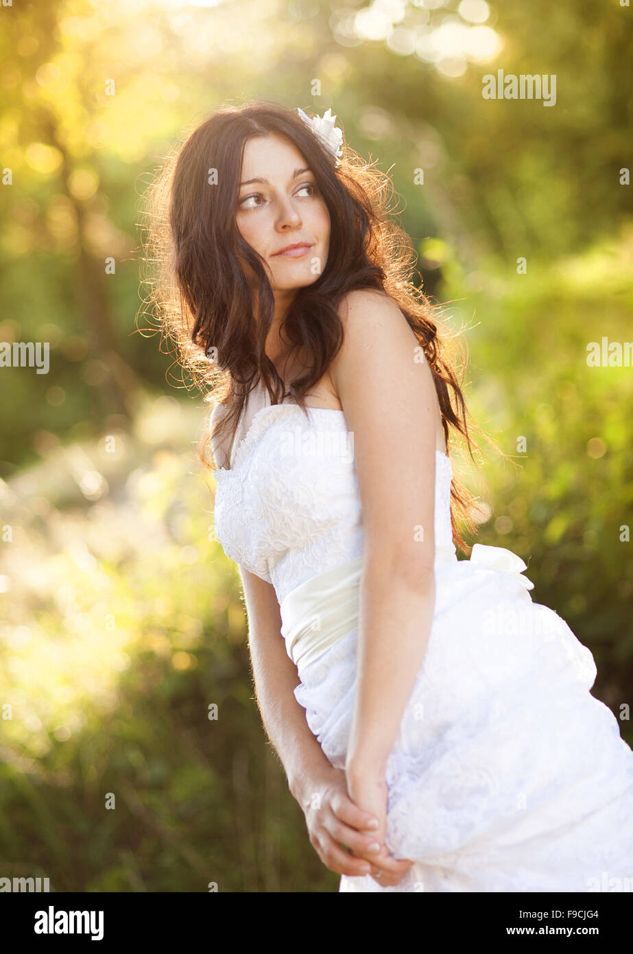 Portrait of beautiful bride in white wedding dress at the meadow Stock ...