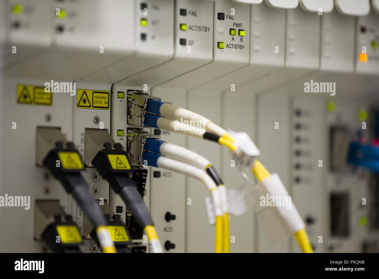 Optical Service Provider service provider data center with media converters and optical cables ...