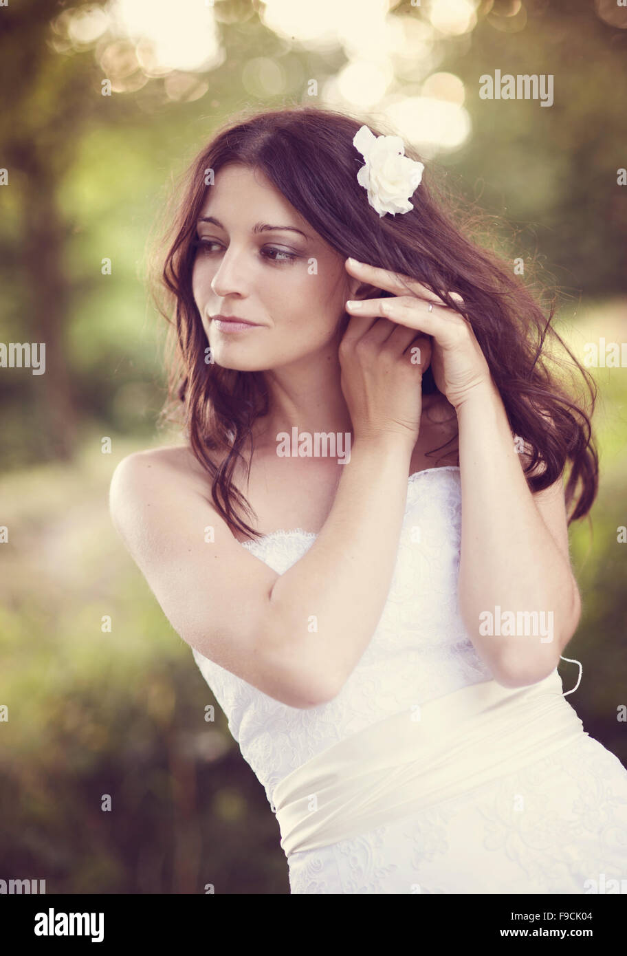 Portrait of beautiful bride in white wedding dress at the meadow Stock ...