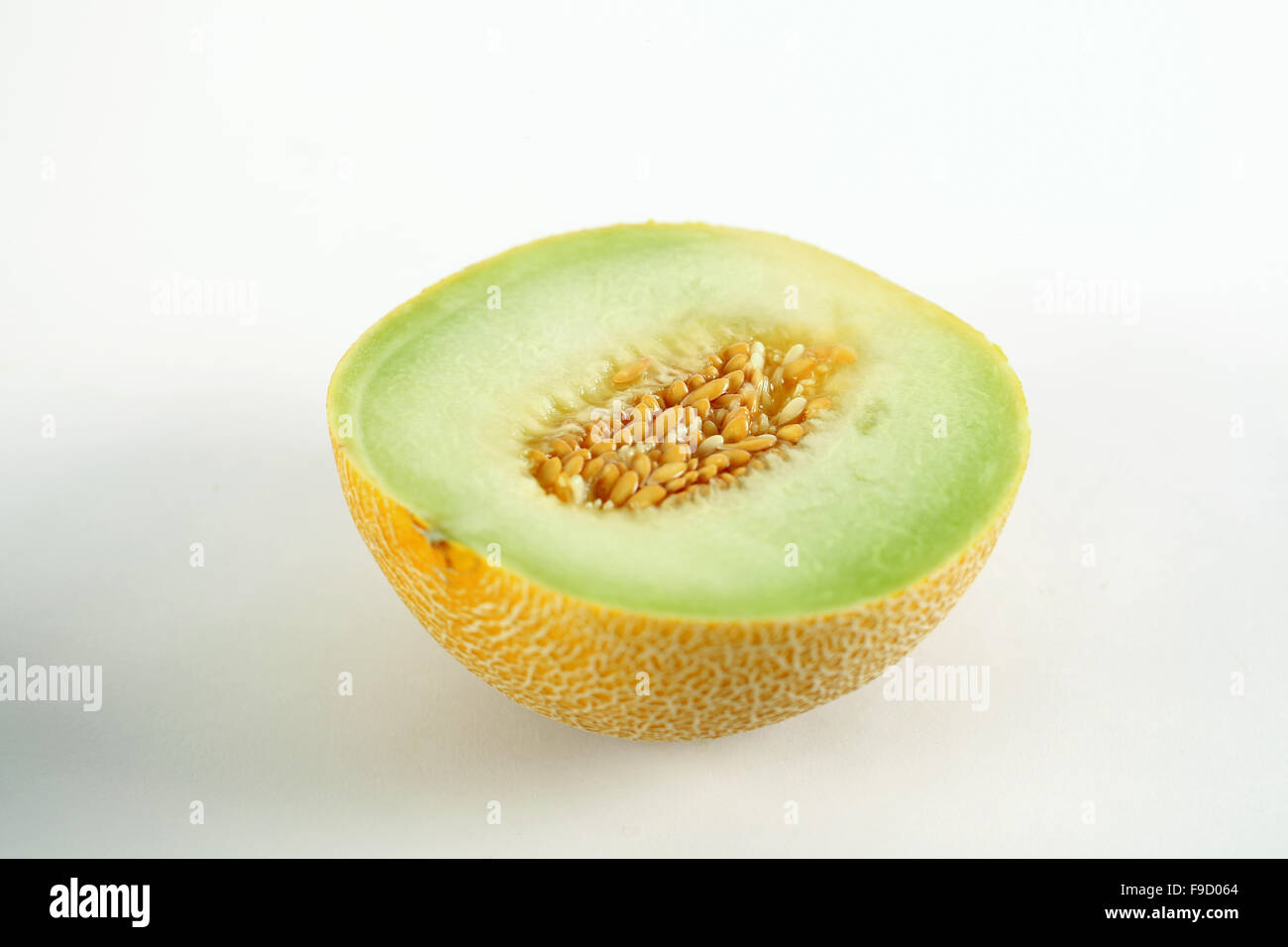 White green yellow melon Full and Sliced Cantaloupe Isolated on White Background Stock Photo