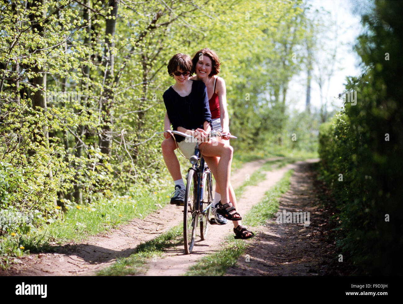 two girls on bike