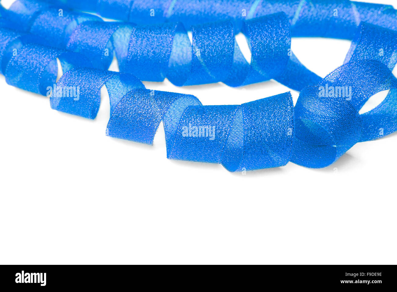 Twisted blue silk ribbon hi-res stock photography and images - Alamy