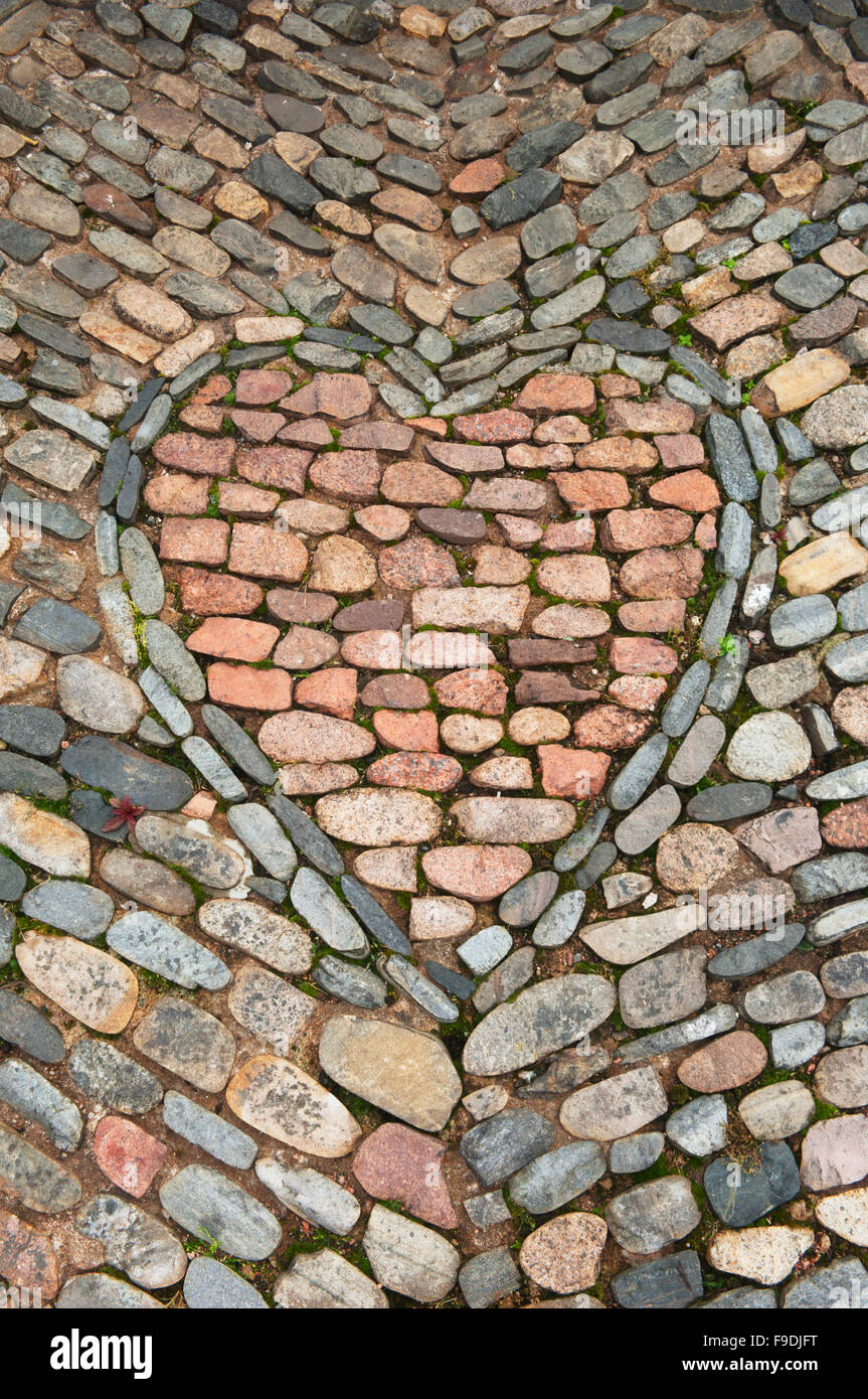 Red stone heart made with cobbles - Pitmedden Garden, near Ellon, Aberdeenshire, Scotland. Stock Photo