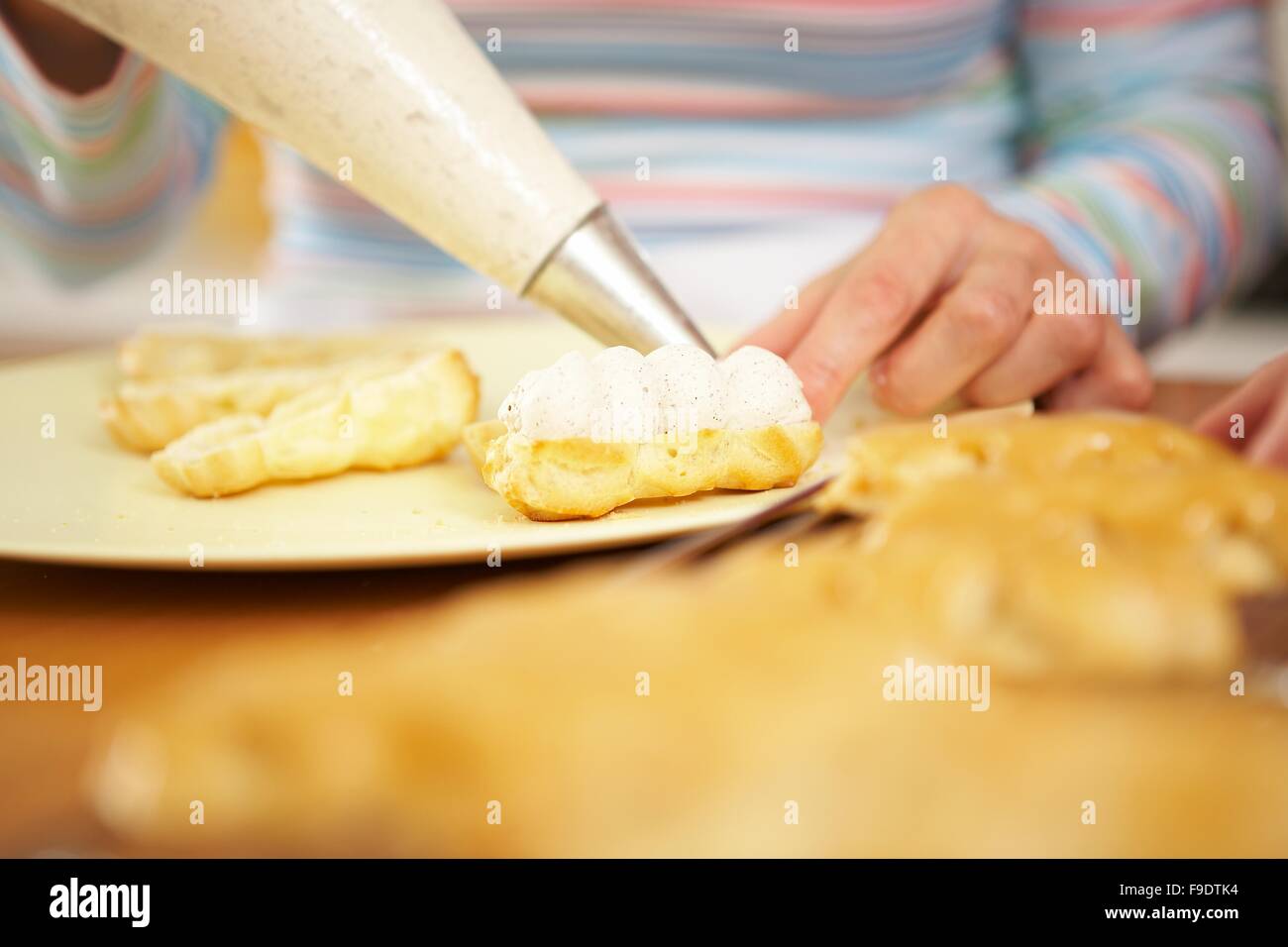 Puff pastry bananas with coffee filling + steps Stock Photo - Alamy