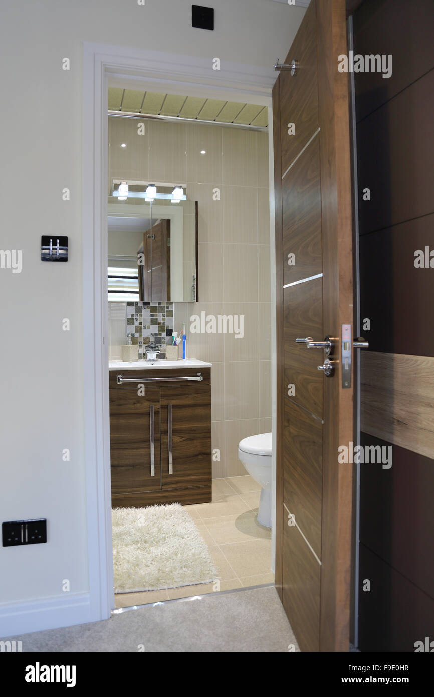 View into a modern en-suite bathroom in a newly refurbished house in ...