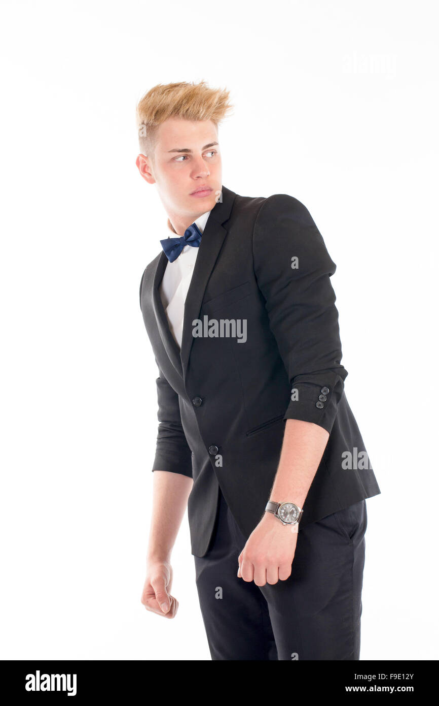 Close-up portrait of a handsome young man in a business suit on white ...
