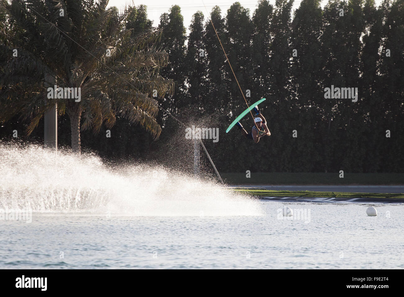 A wakeboarder jumping at Al Forsan wakeboard park in Abu Dhabi Stock