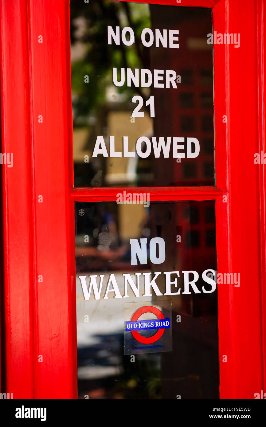 No one under 21 Allowed, No Wankers seen on a Brit Pub door in Santa Barbara CA Stock Photo