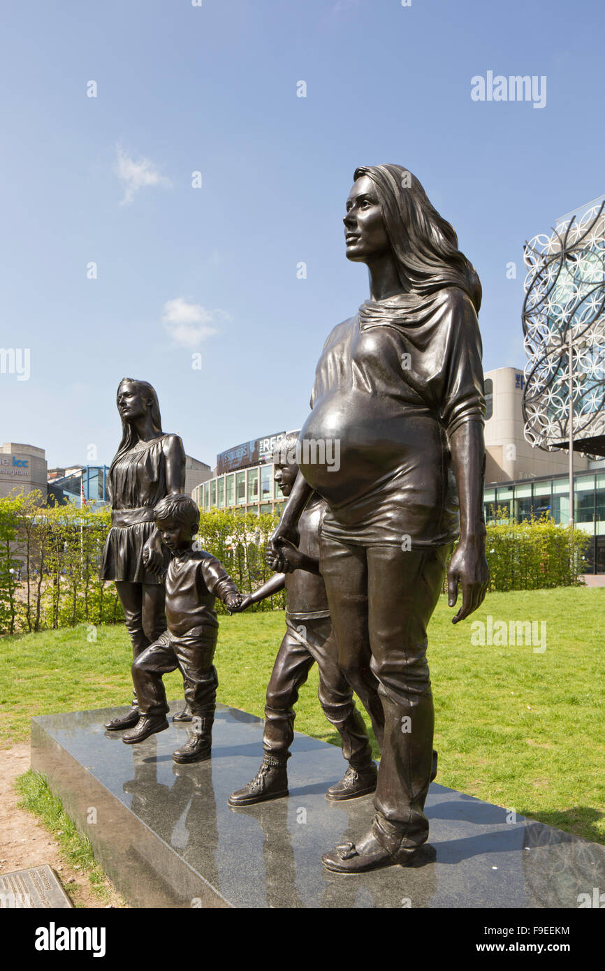 A depiction of sisters Roma and Emma Jones and their children by Gillian Wearing outside Birmingham Library  England, UK Stock Photo