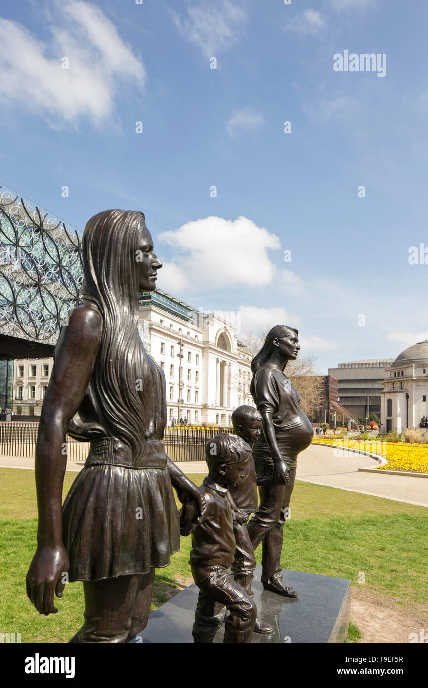A depiction of sisters Roma and Emma Jones and their children by Gillian Wearing outside Birmingham Library  England, UK Stock Photo
