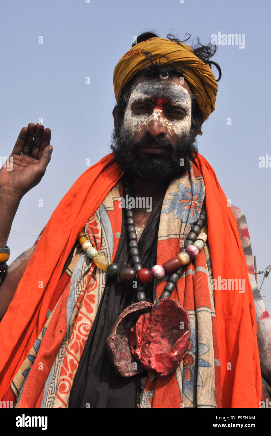 An Aghori Baba's blessings, wearing human skull and bones, ash on the face at Mahakumbh, Prayag, Allahabad, Uttar Pradesh, India Stock Photo