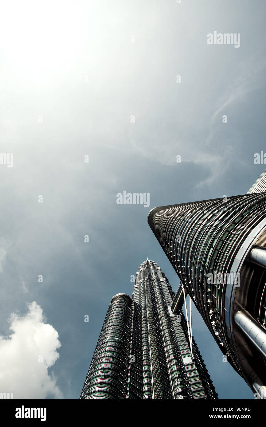 Petronas Towers in Kuala Lumpur twin towers towering high and reaching for the skies like the stunning skyscrapers they are. Once the tallest building Stock Photo