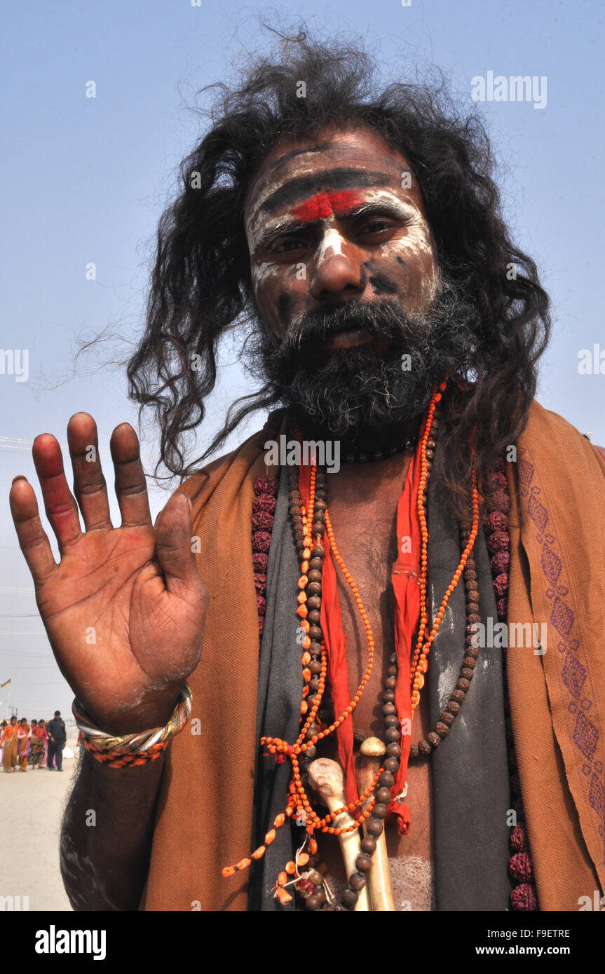 An Aghori Baba with ash and red tilak on face wearing human bones at Mahakumbh Mela at Prayag, Allahabad, Uttar Pradesh, (India) Stock Photo