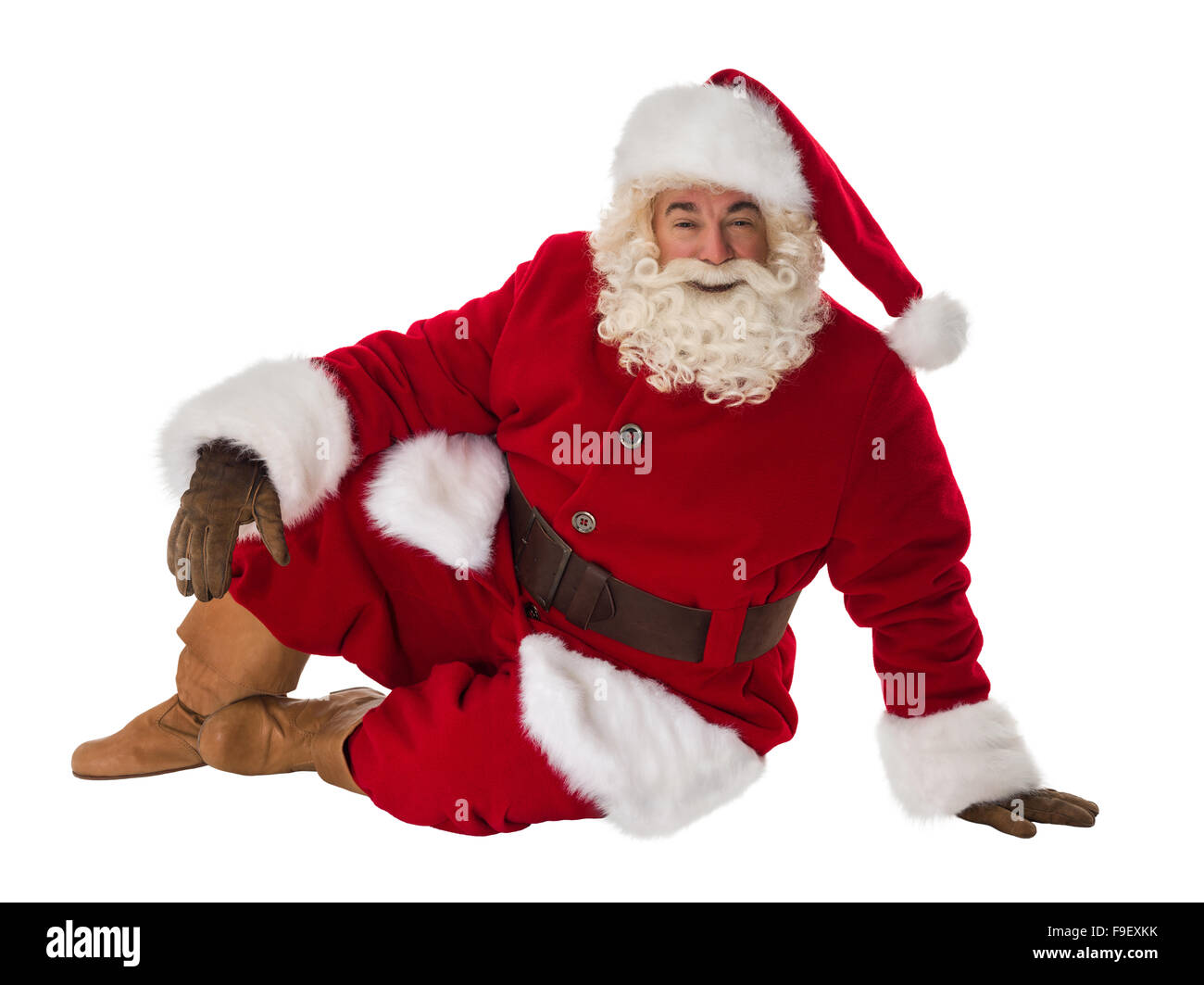 Santa Claus sitting and smiling Portrait Isolated on White Background ...