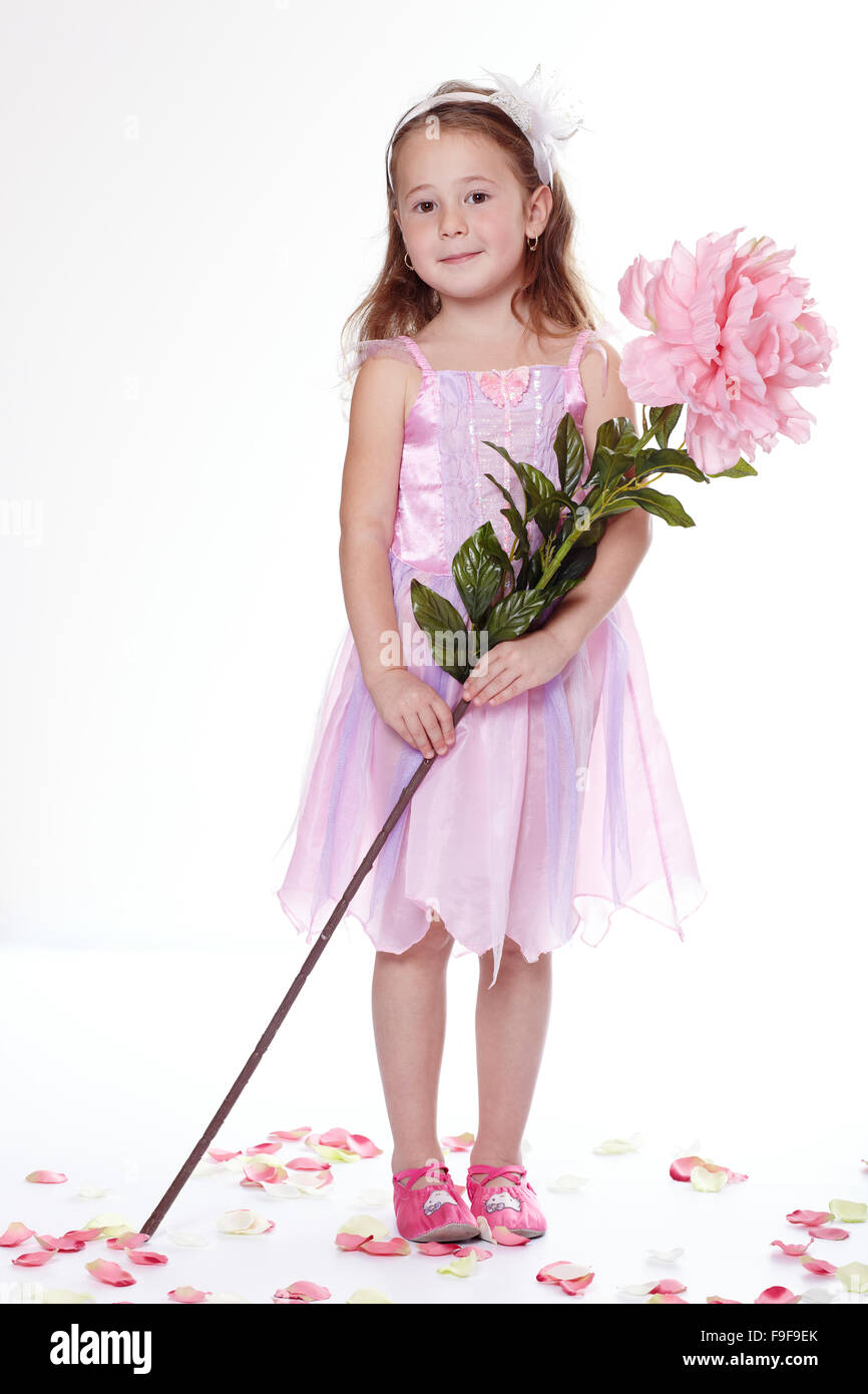 Girl dressed as Princess with Flower Stock Photo