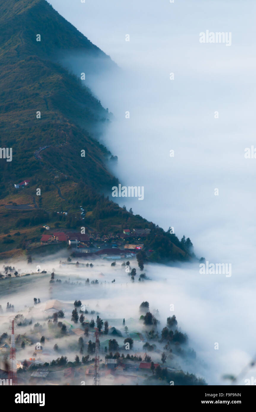 Layer of Mist Over the Mountains and in a village Stock Photo - Alamy