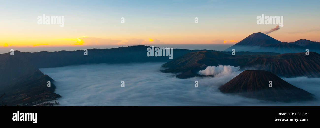 Stunning Sunset and Layer of Mist at volcano Bromo Stock Photo