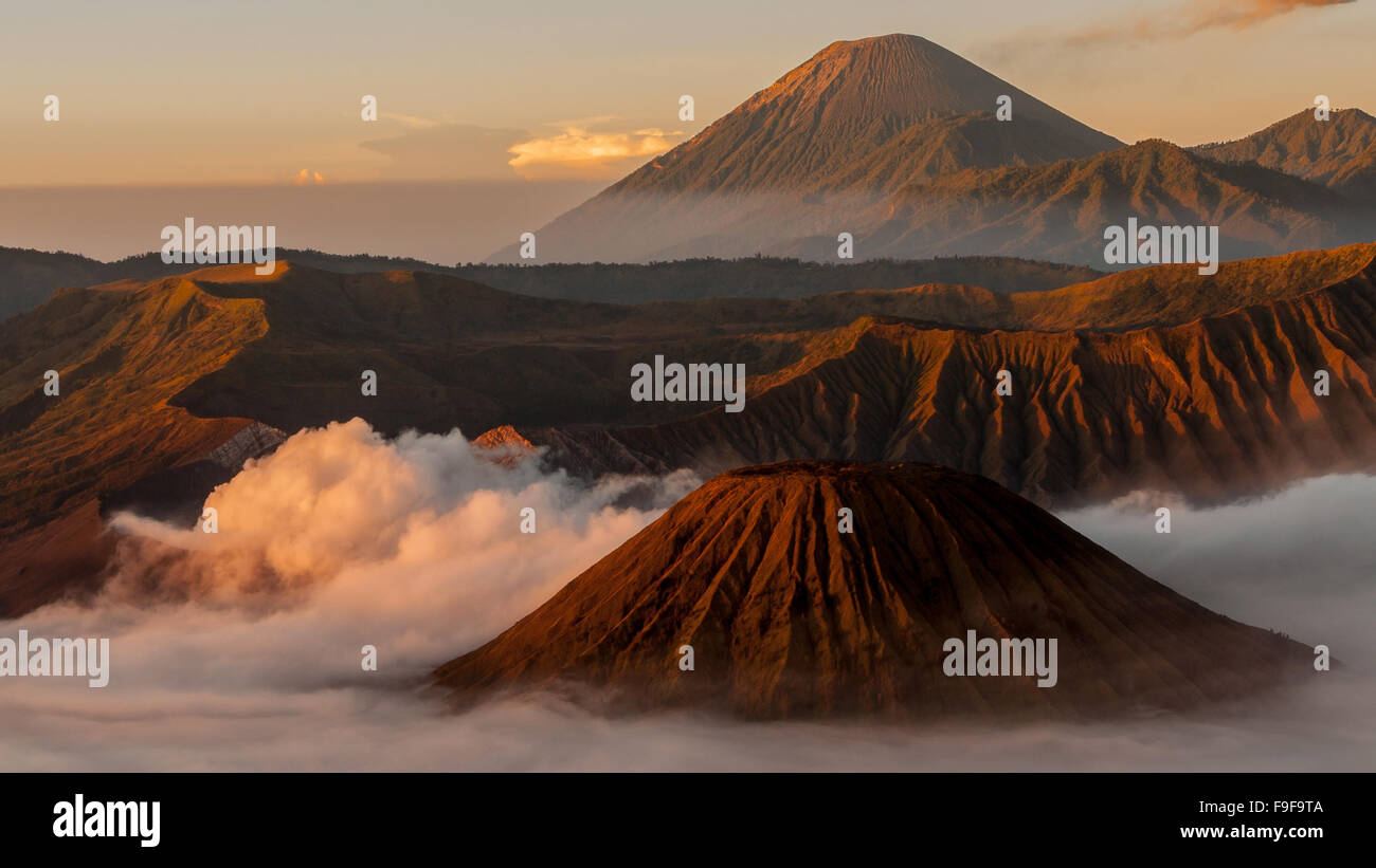 Volcano Bromo with fog and mist at sunrise Stock Photo