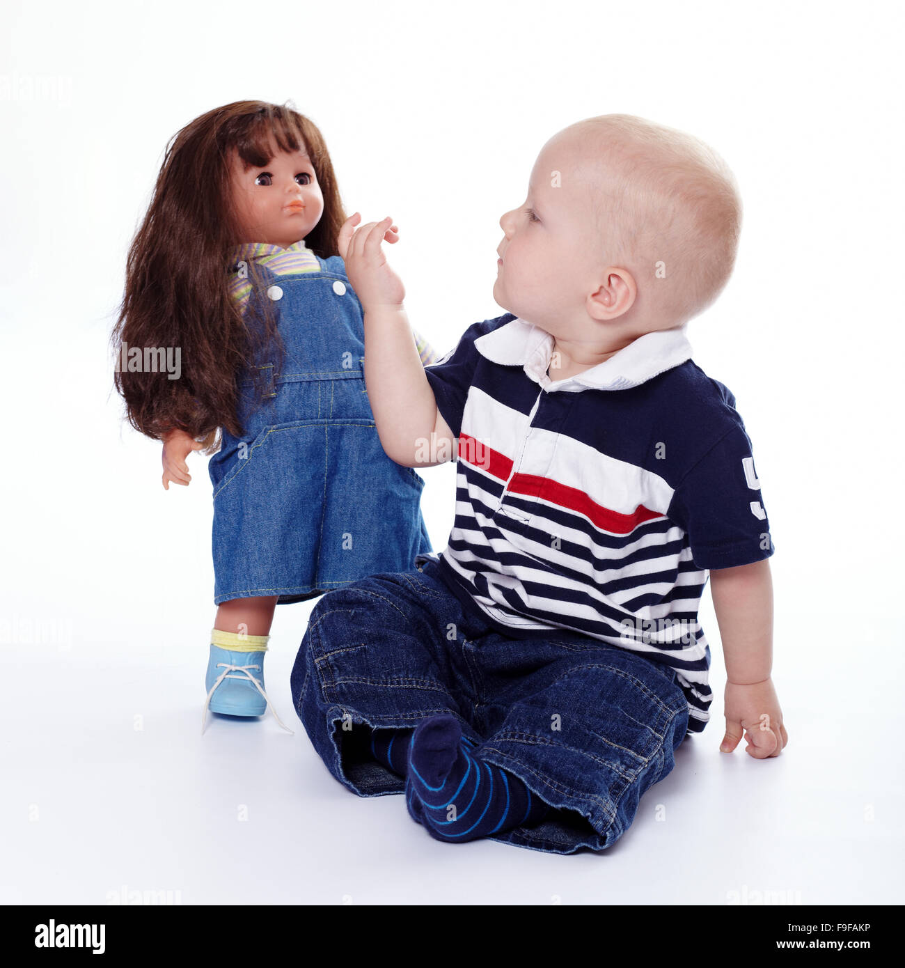 Child with Dolly Stock Photo Alamy