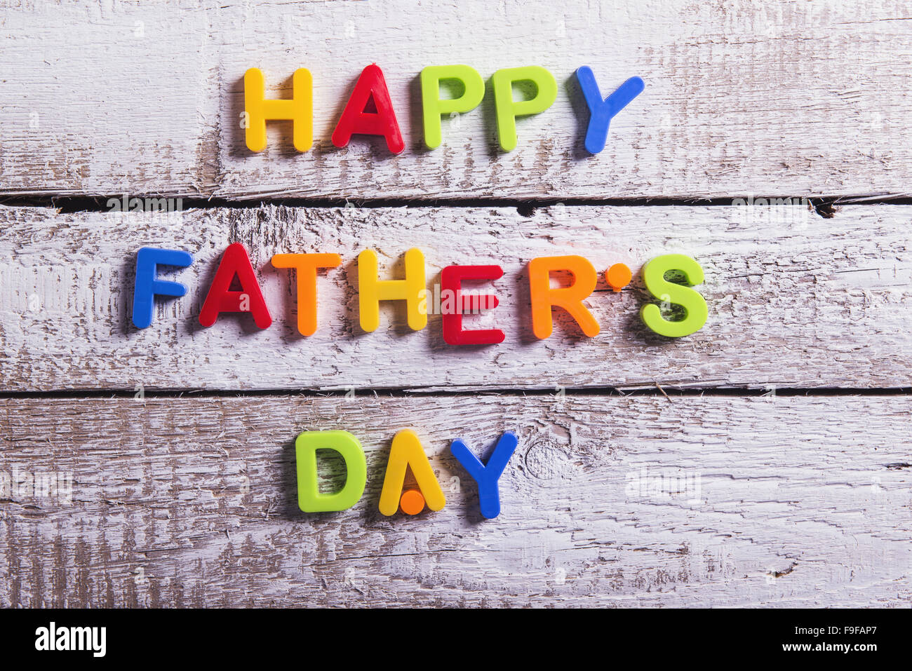 Vintage baseball gear on a wooden background with Father's day greeting  Stock Photo - Alamy