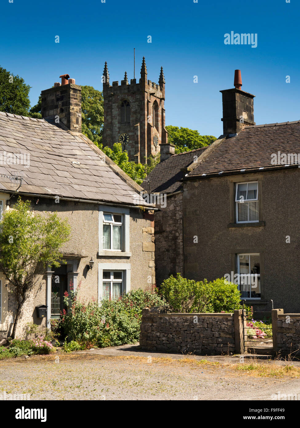 UK, England, Derbyshire, Hartington, Village houses below tower of St