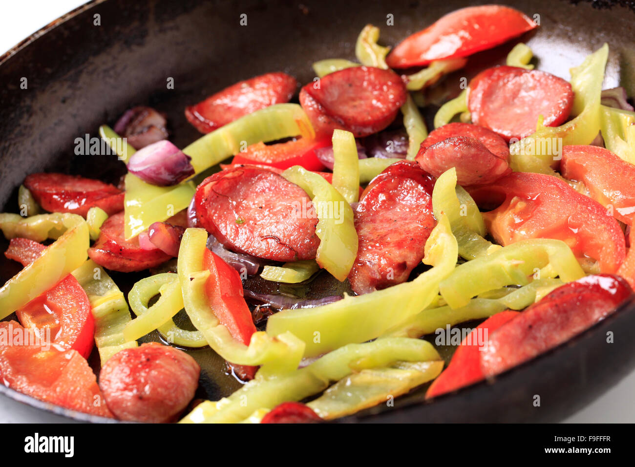 Sausage and vegetable stir fry Stock Photo - Alamy
