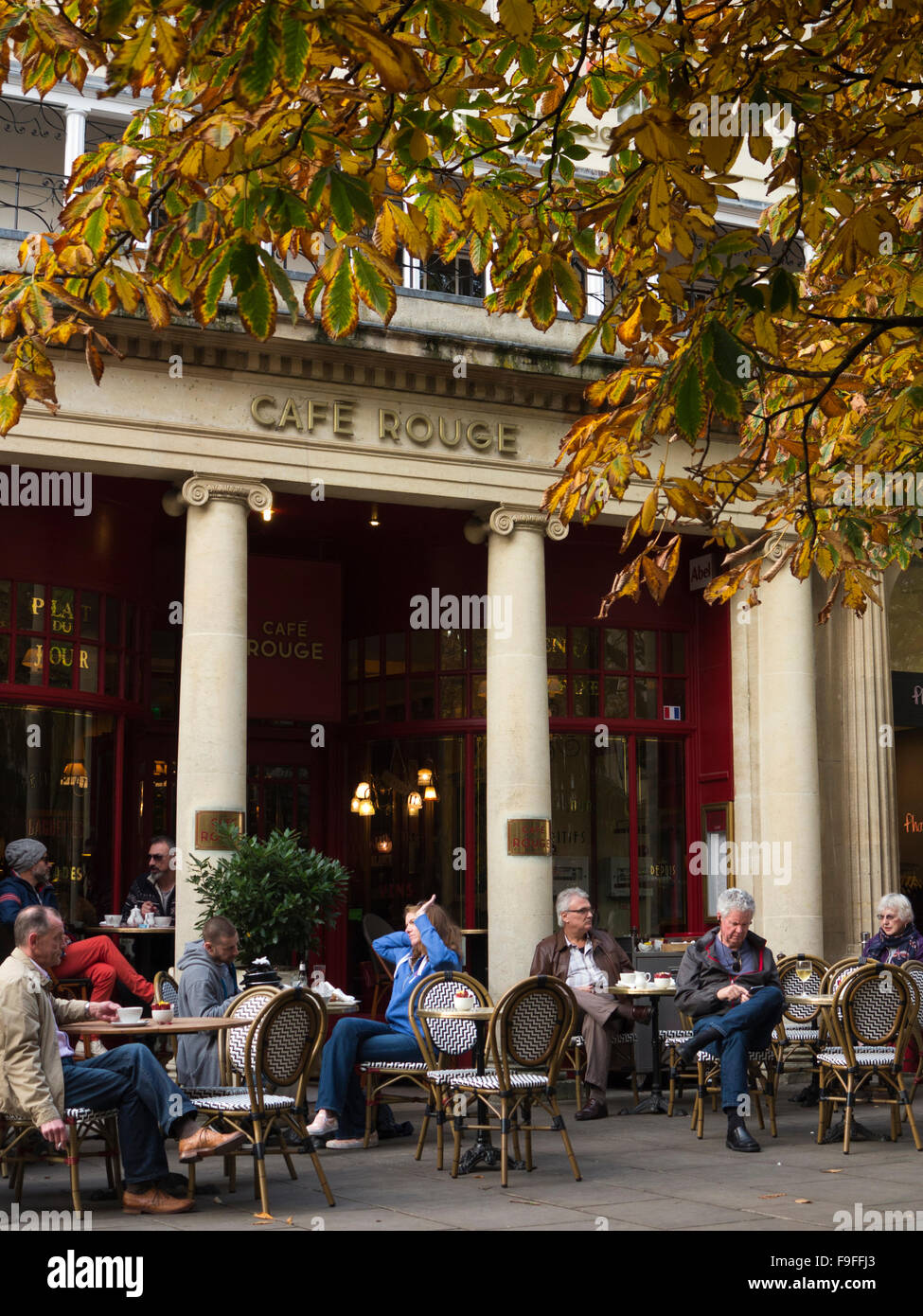 UK, Gloucestershire, Cheltenham, Promenade, Café Rouge, customers sat on pavement tables Stock Photo