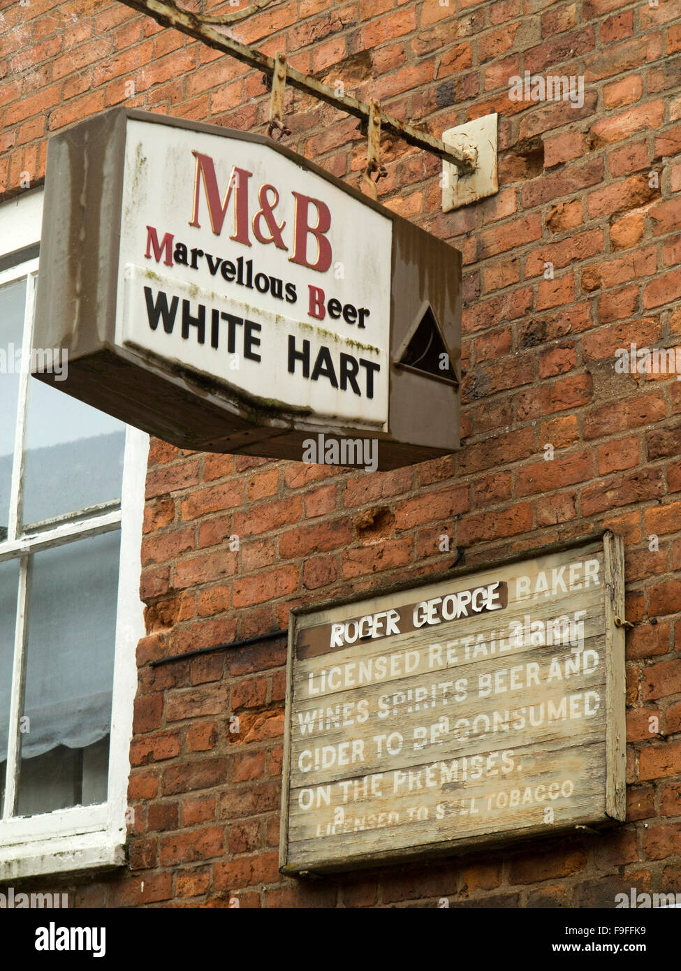 UK, Herefordshire, Ledbury, Church Street, old M&B White Hart former pub sign Stock Photo