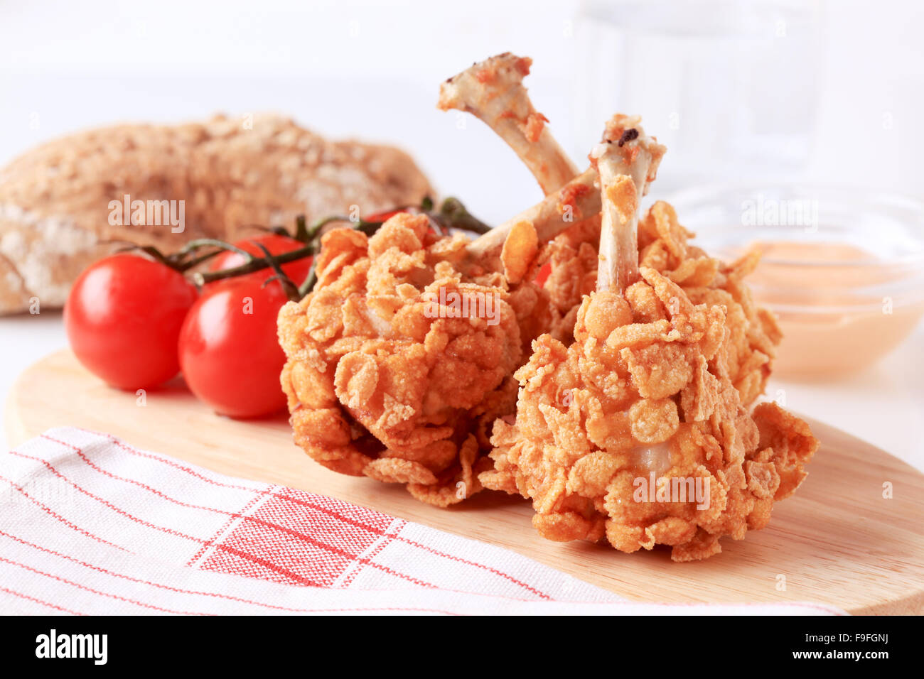 Chicken drumsticks coated with corn flakes Stock Photo Alamy