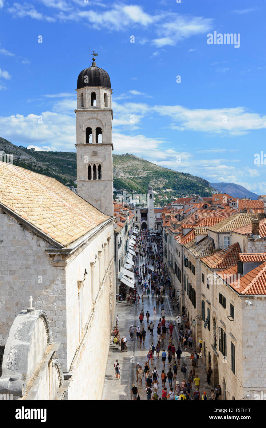 Franciscan Monastery with its tower and the Placa street (main) crowed with tourists, Dubrovnik, Croatia. Stock Photo