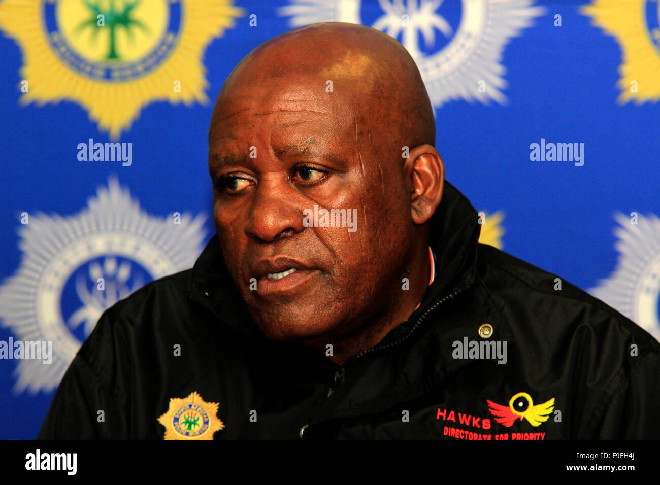 Durban. 16th December, 2015. Major General Berning Ntlemeza, the head of the South African  police's elite Directorate for Priority Crime Investigations tells reporters that he has submitted a proposal that anyone convicted of being illegally in possession of a gun should be subjected to a minimum term of life imprisonment, which in South Africa is 25 years, before parole consideration. Ntlemeza was speaking at a press conference to launch the police's annual festive season crackdown. Credit:  Giordano Stolley/Alamy Live News Stock Photo