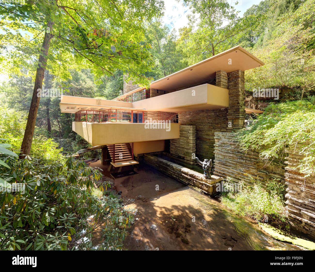 Fallingwater or Kaufmann Residence aka Falling Water is a house by architect Frank Lloyd Wright. Stock Photo