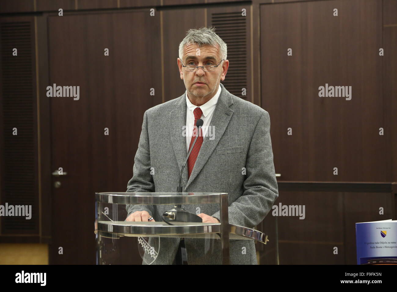 Sarajevo, BiH. 16th Dec, 2015. Judge of the Court of Bosnia and Herzegovina (BiH) Davorin Jukic speaks in the courtroom, inside the court, in Sarajevo, BiH, Dec. 16, 2015. The Court of BiH marks the 10th anniversary of the founding of the War Crimes Chamber on Wednesday. © Haris Memija/Xinhua/Alamy Live News Stock Photo