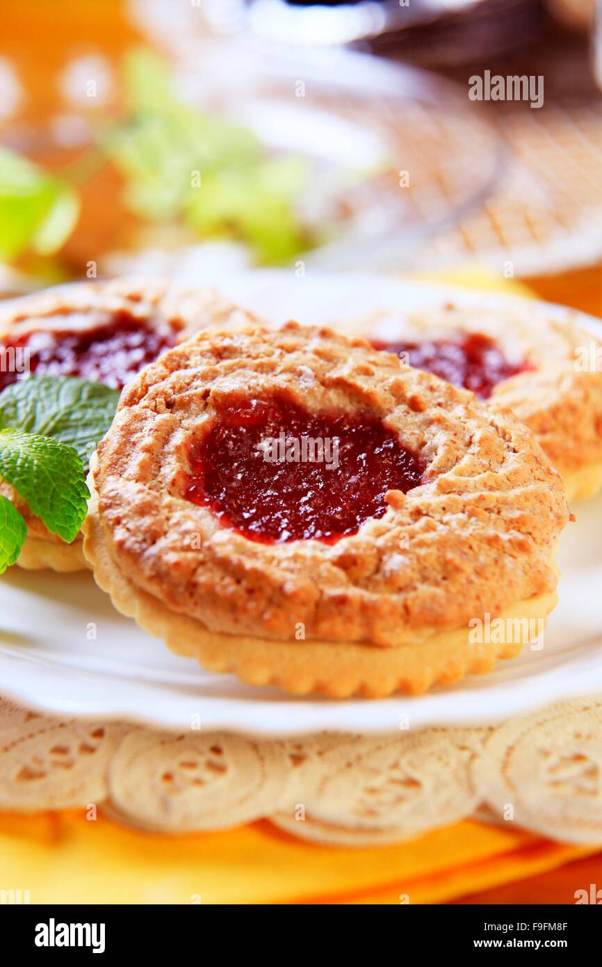 Shortbread biscuits with sweet topping and jam Stock Photo Alamy