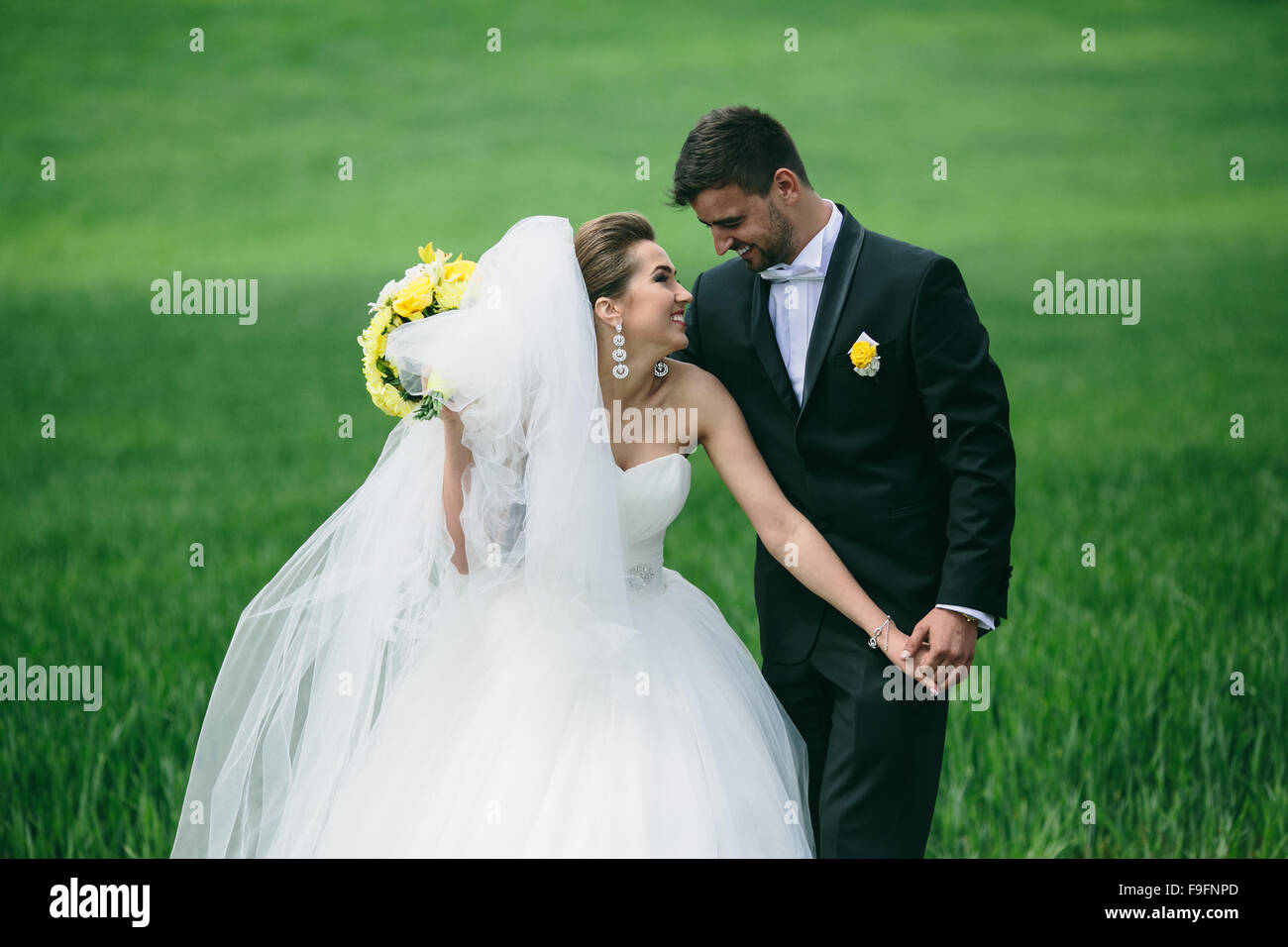 Beautiful wedding couple on nature Stock Photo - Alamy