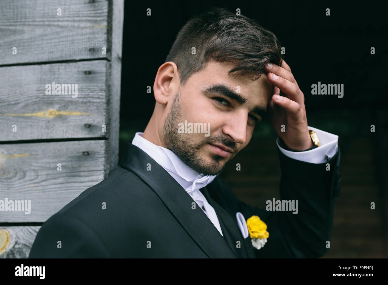 Handsome smiling groom close hi-res stock photography and images - Alamy