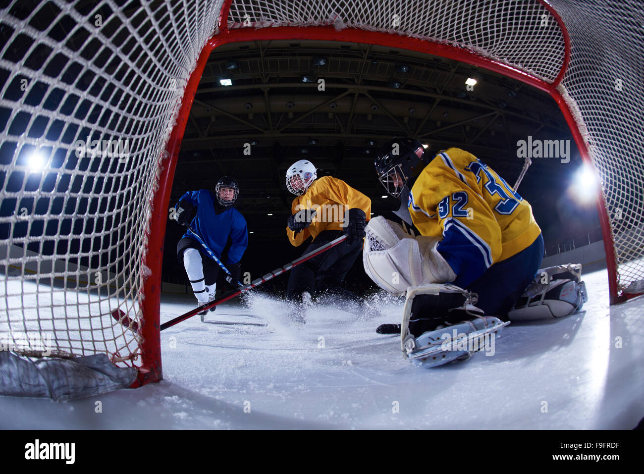 ice hockey goalkeeper player on goal in action Stock Photo Alamy