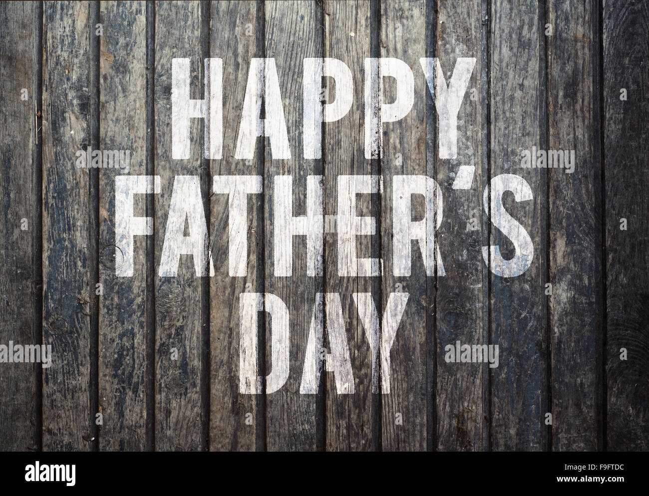 Happy fathers day sign on wooden boards background Stock Photo - Alamy